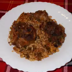 Pierna de cordero con arroz y vinagrera