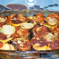 Esturión al horno con cebolla y tomate