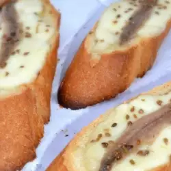 Crostini con anchoas y mozzarella