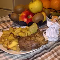 Filetes y chuletas con patatas