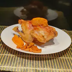 Pollo con naranjas