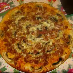 Pizza de carne y champiñones