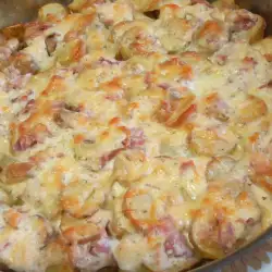 Patatas al horno con bacon y quesos
