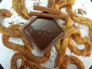 Churros con chocolate y canela