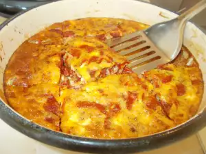 Pimientos con queso y huevos al horno