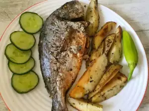 Dorada al horno con guarnición