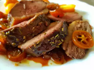 Magret de pato al horno con miel y kumquat