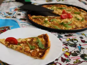 Pizza casera con quesos