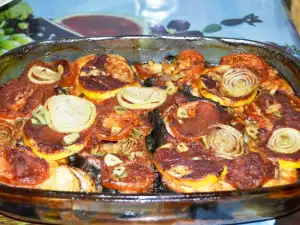 Esturión al horno con cebolla y tomate