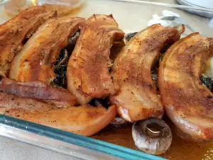 Panceta de cerdo al horno con champiñones