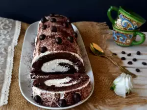 Brazo gitano de cacao con café y nata