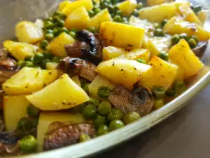 Patatas al horno con champiñones y guisantes