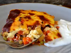 Moussaka con zanahorias, patatas y guisantes