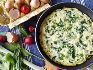 Tortilla de queso y verduras de hoja verde