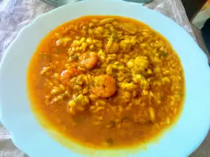 Arroz caldoso con sepia y gambas peladas