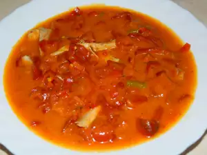 Pollo al curry con pimientos rojos