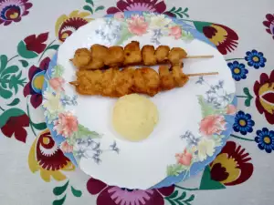 Brochetas de pollo rebozadas