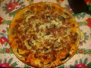 Pizza de carne y champiñones