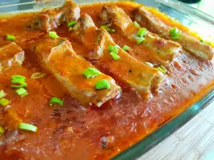 Costillas de cerdo al horno con salsa de tomate