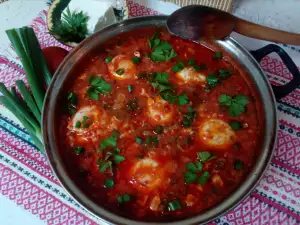 Huevos escalfados en salsa de tomate