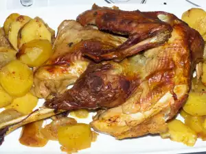 Pavo al horno con vino blanco y patatas