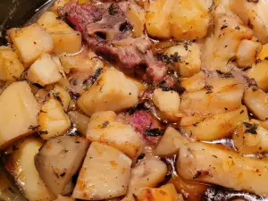 Huesos de cerdo con patatas en Crock pot