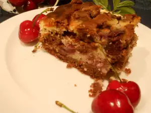 Pastel de chocolate con ricotta, coco y cerezas