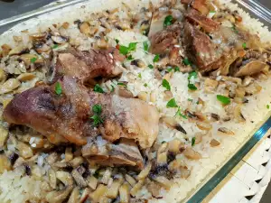 Codillo de cerdo con arroz y champiñones