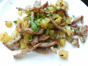 Julianas de cerdo con patatas a la sartén