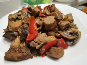 Cerdo con champiñones y pimientos