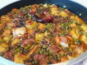 Cerdo al horno con guisantes y patatas