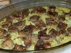 Arroz al horno con carne de cerdo muy jugosa