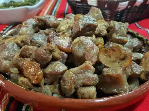 Cerdo con cebolla y champiñones