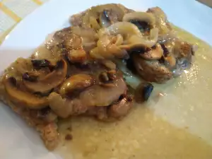 Ternera asada con champiñones