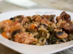 Ternera con arroz y espinacas al horno