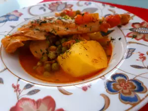 Conejo con guisantes y patatas