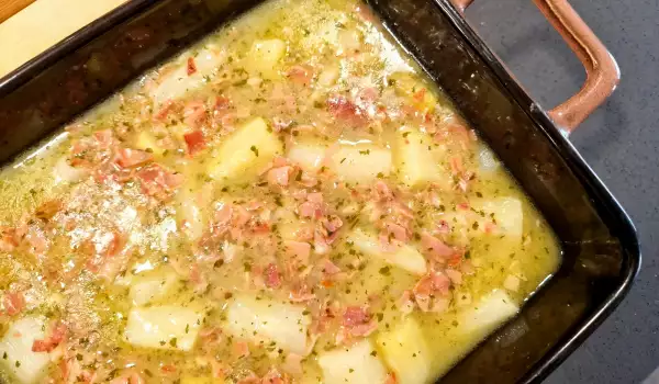 Espárragos blancos en salsa de cebolla y ajo con jamón
