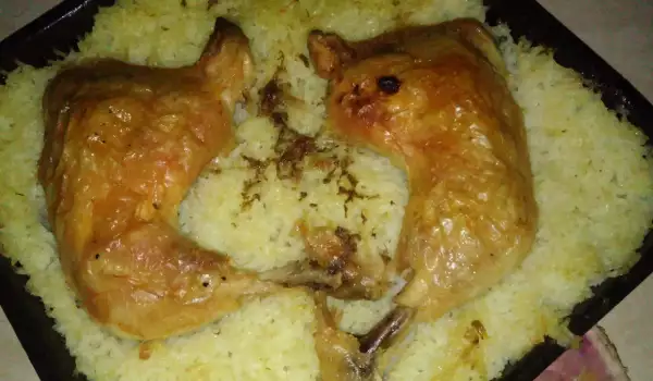 Arroz al horno con muslos de pollo