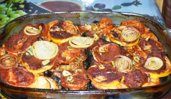 Esturión al horno con cebolla y tomate