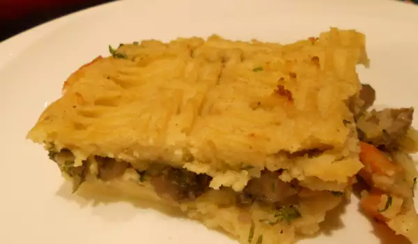 Pastel de patata relleno de champiñones