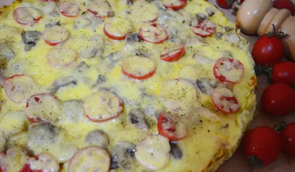 Pizza keto dietética con masa de calabacín