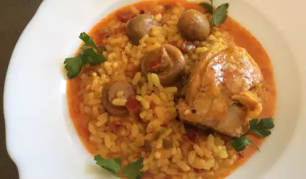 Arroz meloso con conejo y champiñones