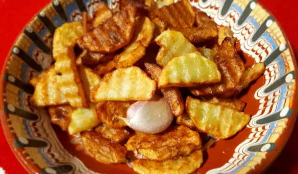 Patatas fritas al ajillo