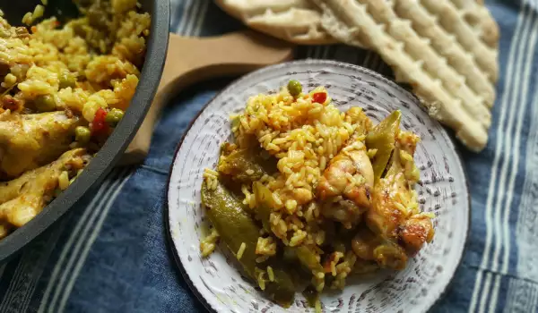 Arroz al curry con jamoncitos de pollo a la sartén