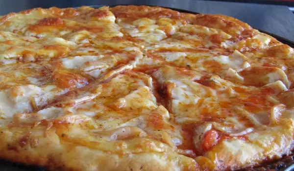 Pizza con jamón cocido, mozzarella y queso fundido
