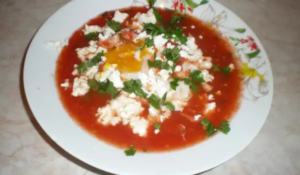Huevos escalfados en salsa de tomate