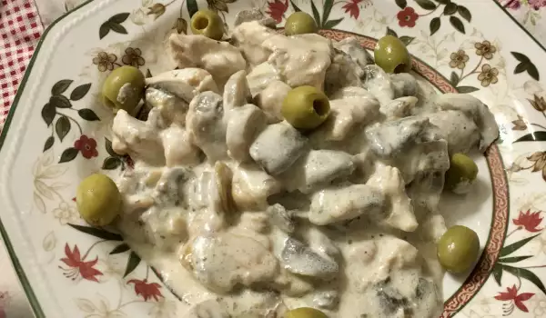 Pechuga de pavo con champiñones en salsa blanca