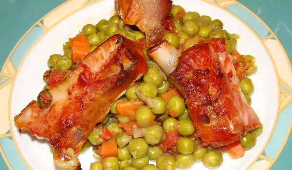 Costillas con guisantes al horno