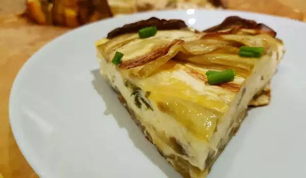 Pastel salado con queso, berenjena y cebolleta de verdeo