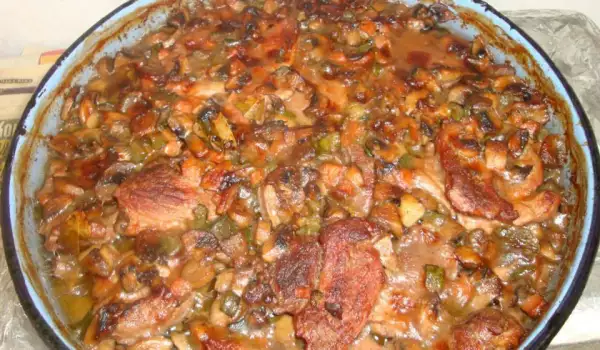 Filetes de cerdo con champiñones y pepinillos al horno